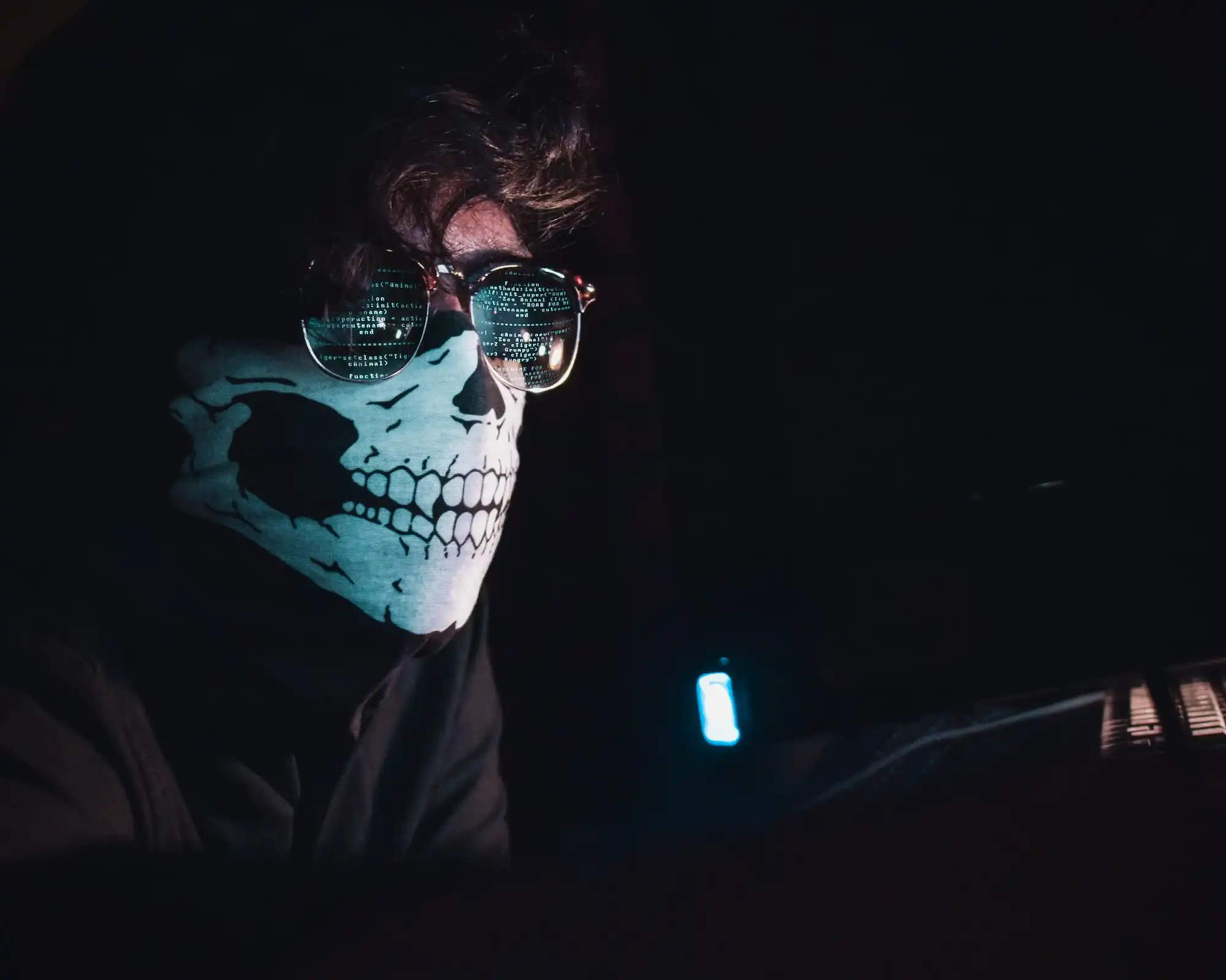 Hackerlike person looking at screen